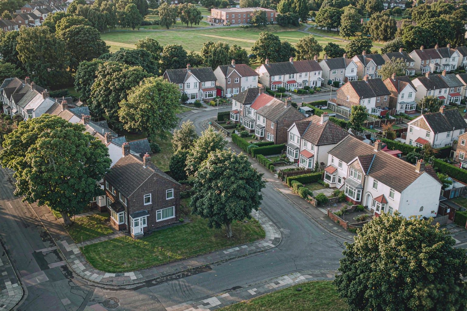 Home Aerial view of a mature English residential neighbourhood
