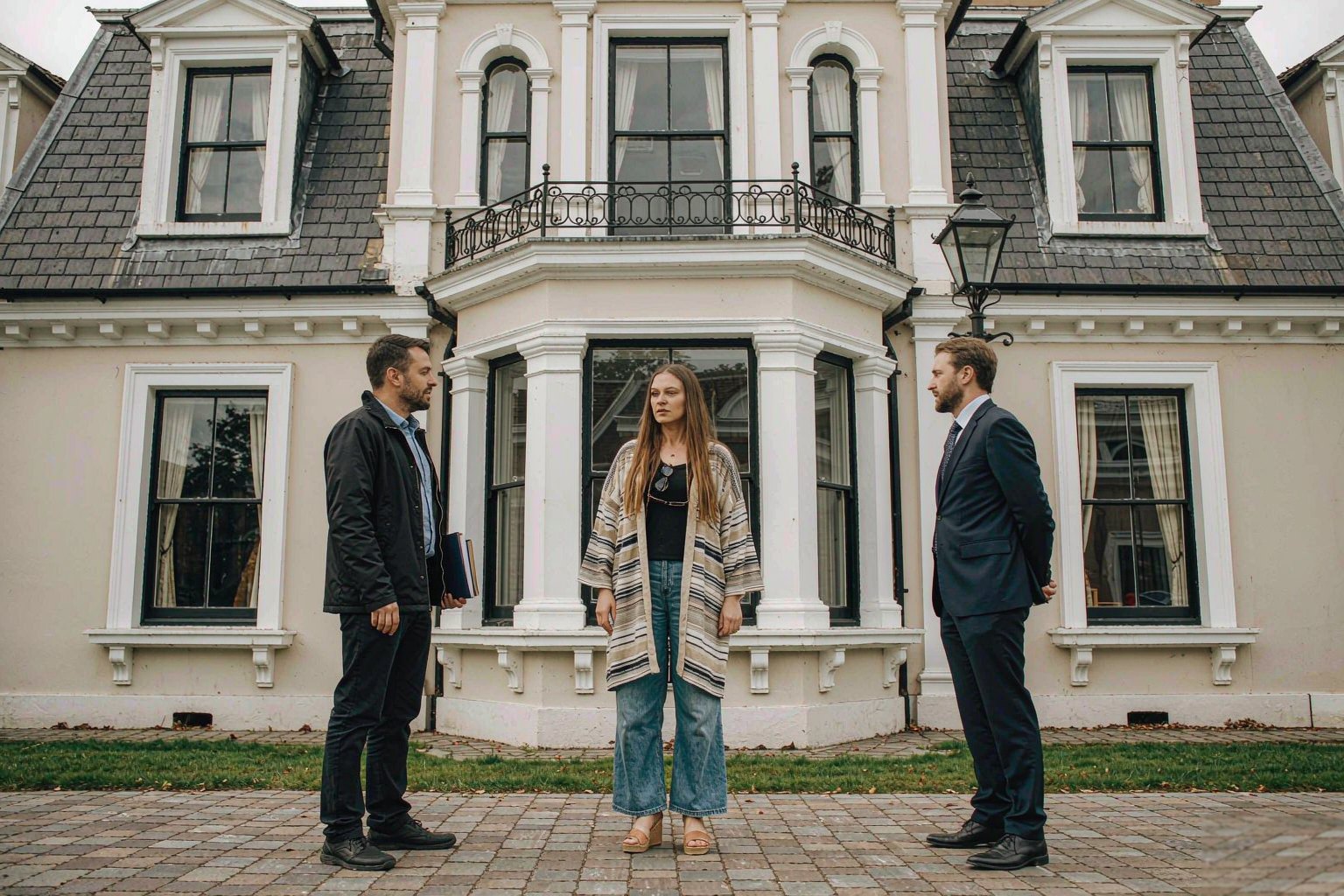 Home Couple viewing a house with a property advisor